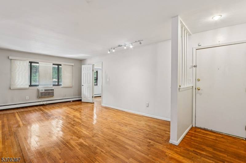 Welcome to this rarely available and generously sized unit in highly sought after Regent Village !
