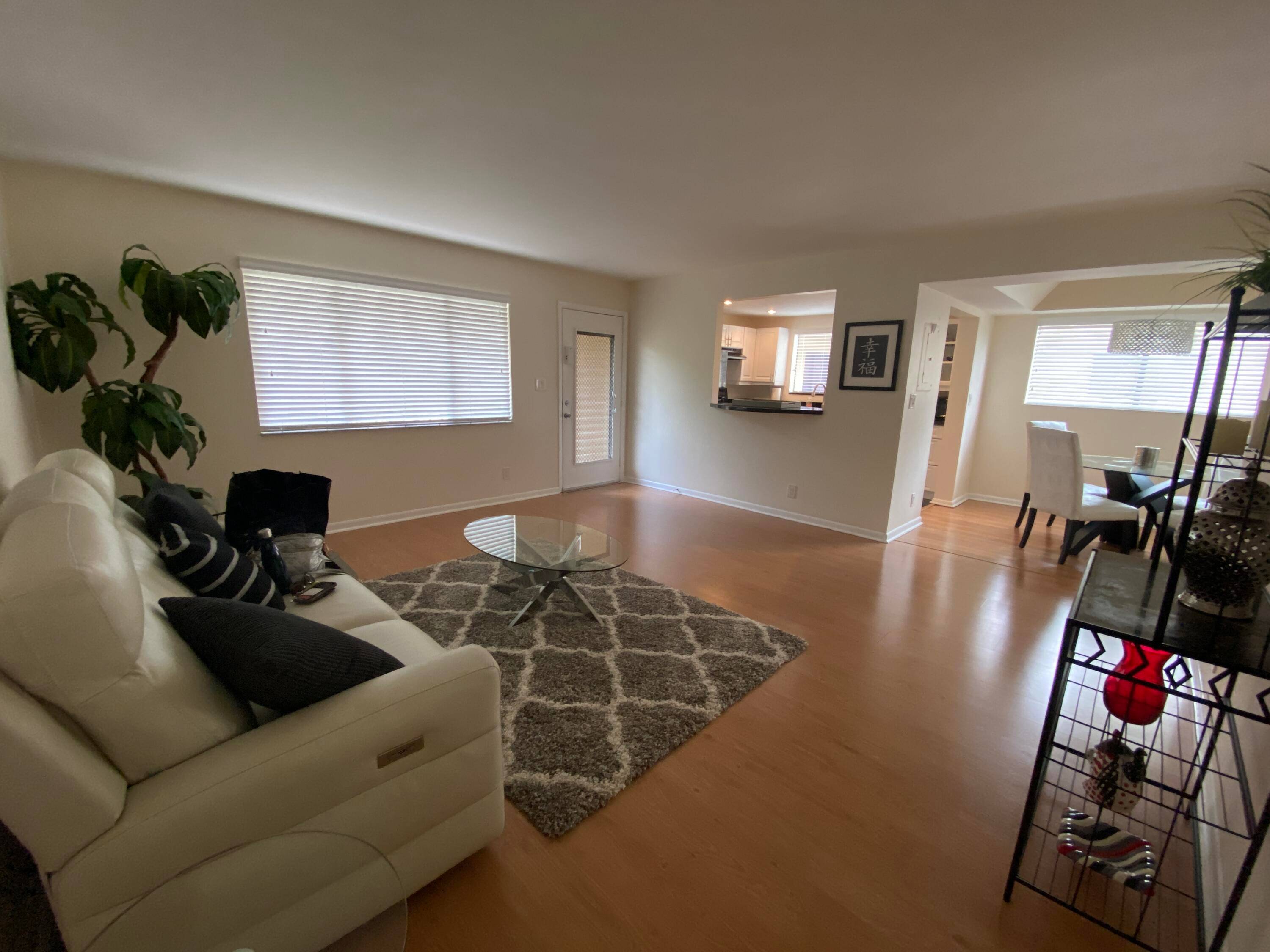 Absolutely stunning pristine move in ready condo in the much sought after active and friendly 55 Community of Lakes of Delray.