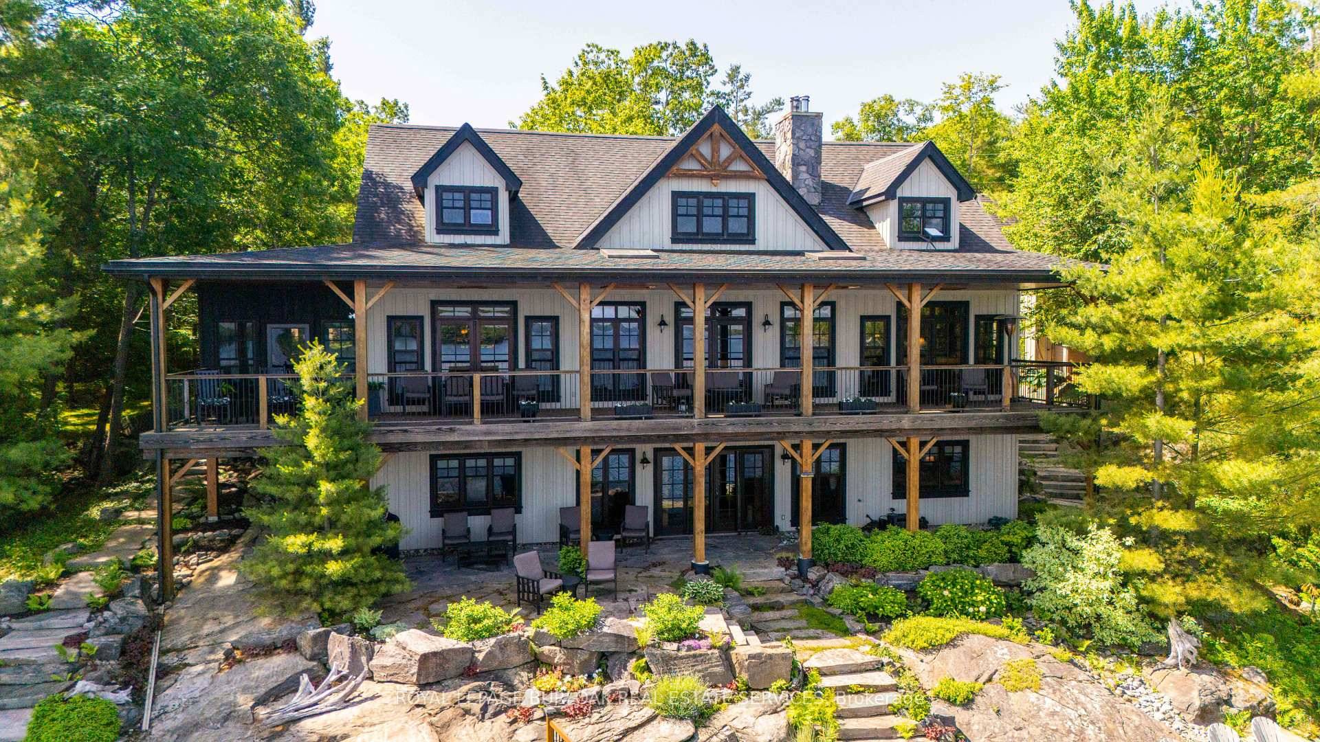 Remarkable Muskoka lakeside retreat on Six Mile Lake, on year round municipal road, only 90 minutes from GTA.