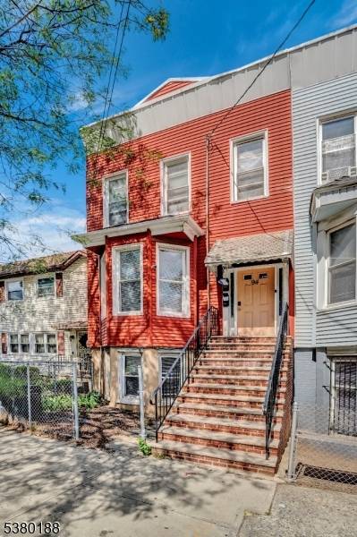 Beautiful Brickfaced Multi Family House in the heart of Jersey City.