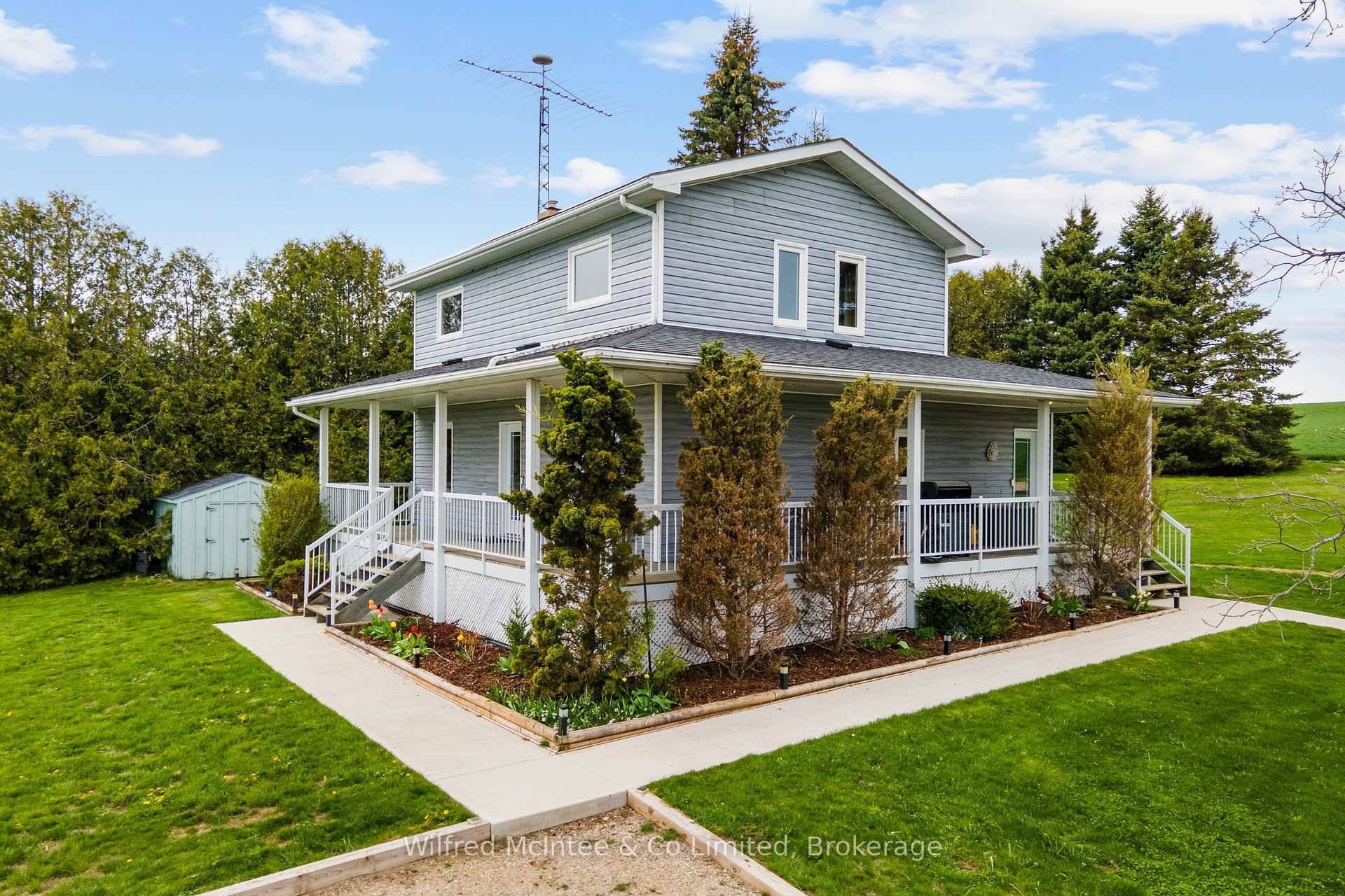 Escape the hustle and bustle of town and settle into peaceful country living with this charming two story home set on a one of a kind 1.