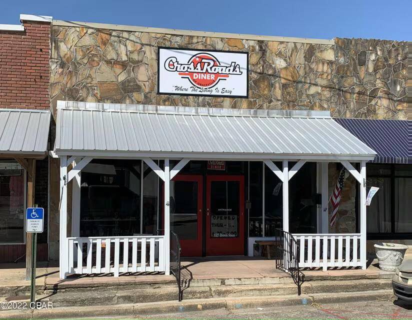 Discover a unique opportunity in the heart of Graceville with this historic restaurant property at 5327 Brown Street.