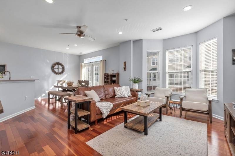 Move in ready Granville model townhouse located in the gated community of Essex Park, across from Hendricks Field Golf Course.