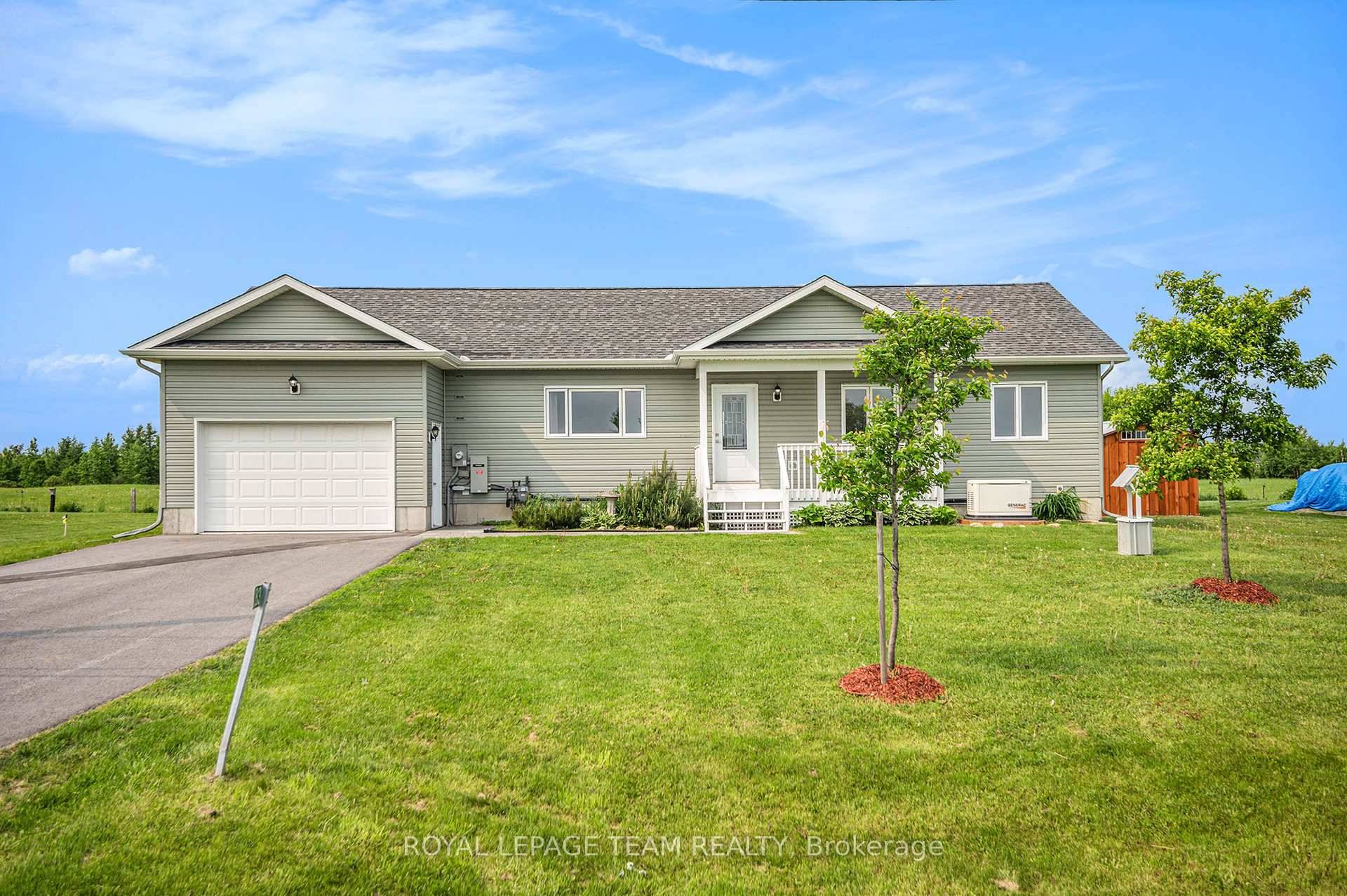 Welcome to 2833 Dunrobin Rd, where modern elegance meets tranquil country living.