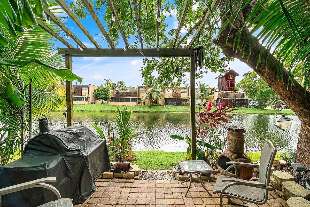 Beautifully maintained by the original owners, this spacious lakefront townhome in Welleby is the largest unit in the community !