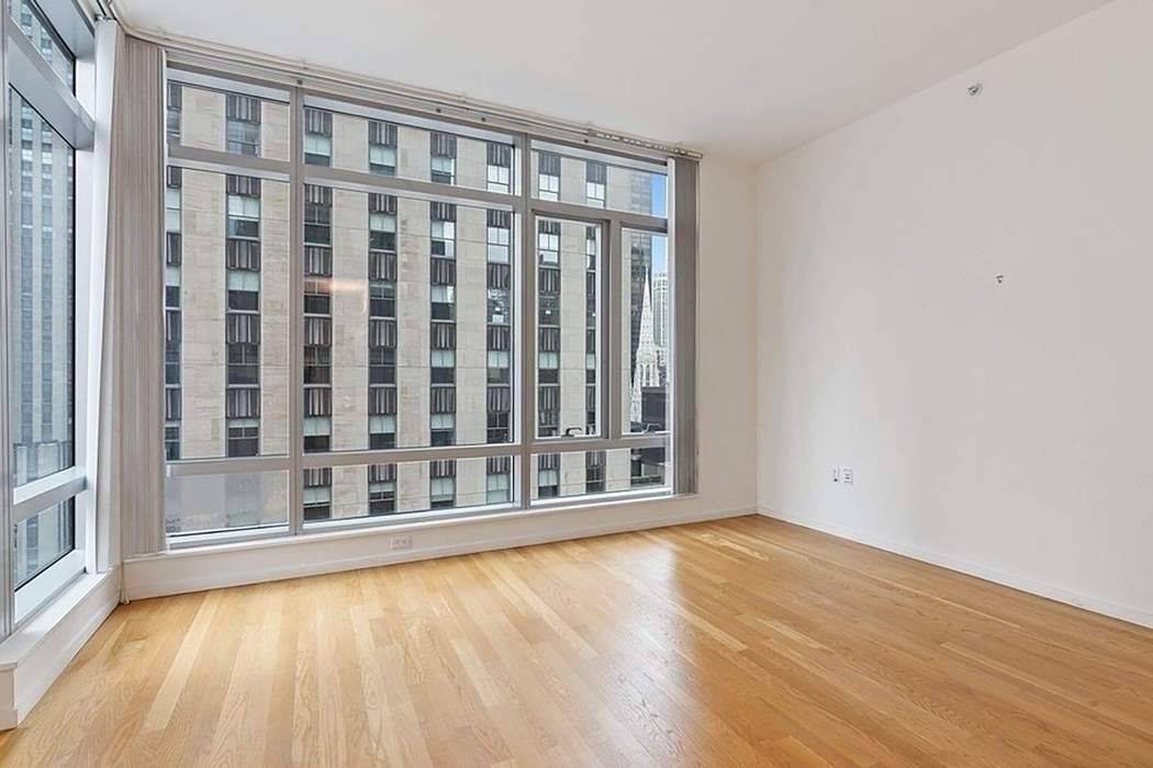 Unit 17A at The Centria, located at 18 West 48th Street in Midtown Manhattan, offers a spacious and modern living experience.