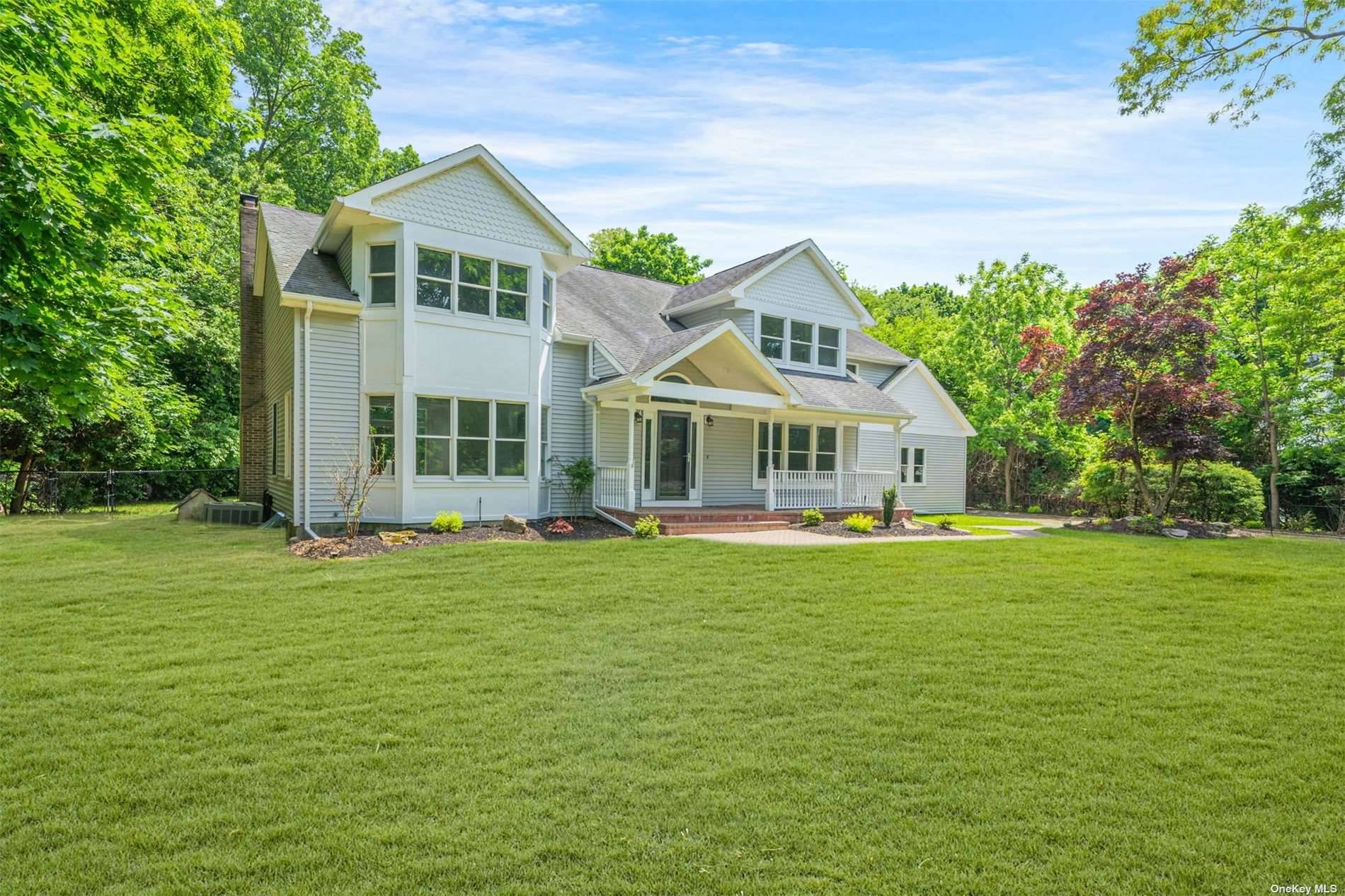 Step into this beautifully renovated colonial residence nestled on a.