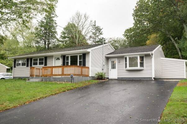 A True Gem in Mystic ! Discover this meticulously maintained and thoughtfully remodeled three bedroom, 2 bath ranch located just minutes from the vibrant charm of Mystic's downtown.