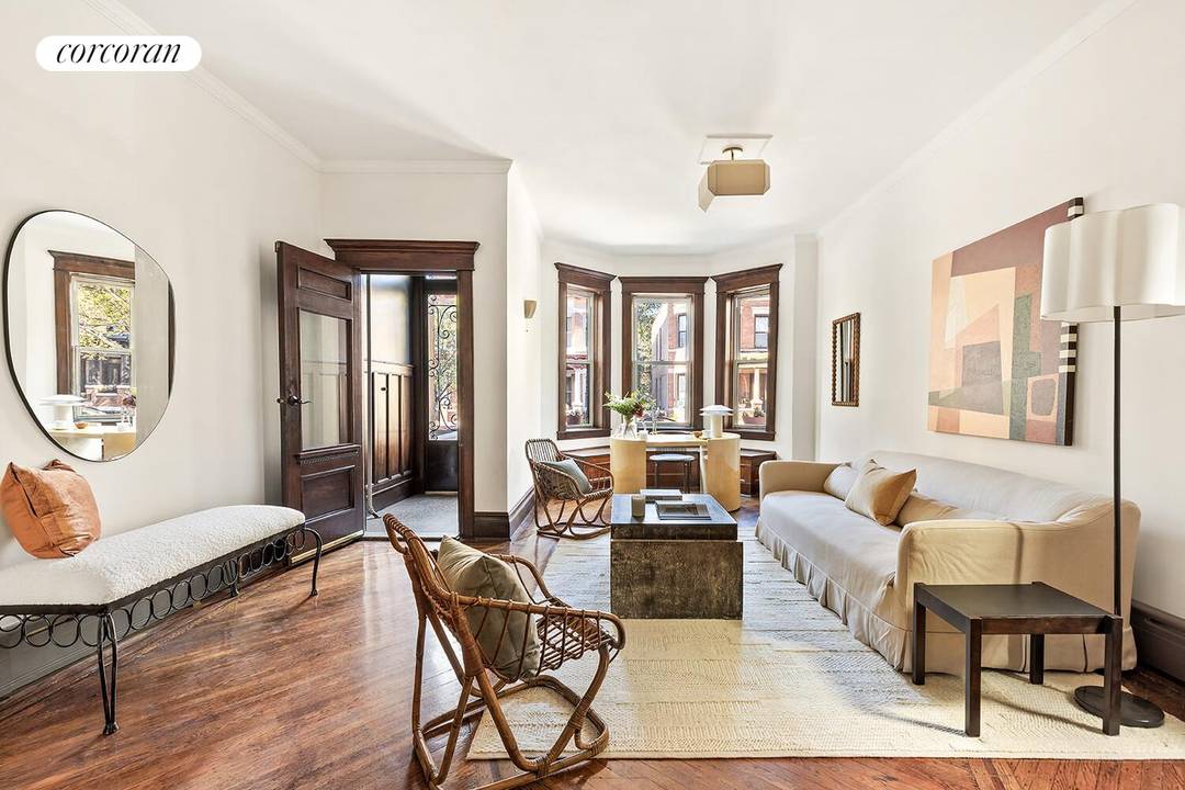Welcome to 20 Stephens Court a rare, extra wide Brooklyn treasure blending historic charm, natural light, and modern upgrades.