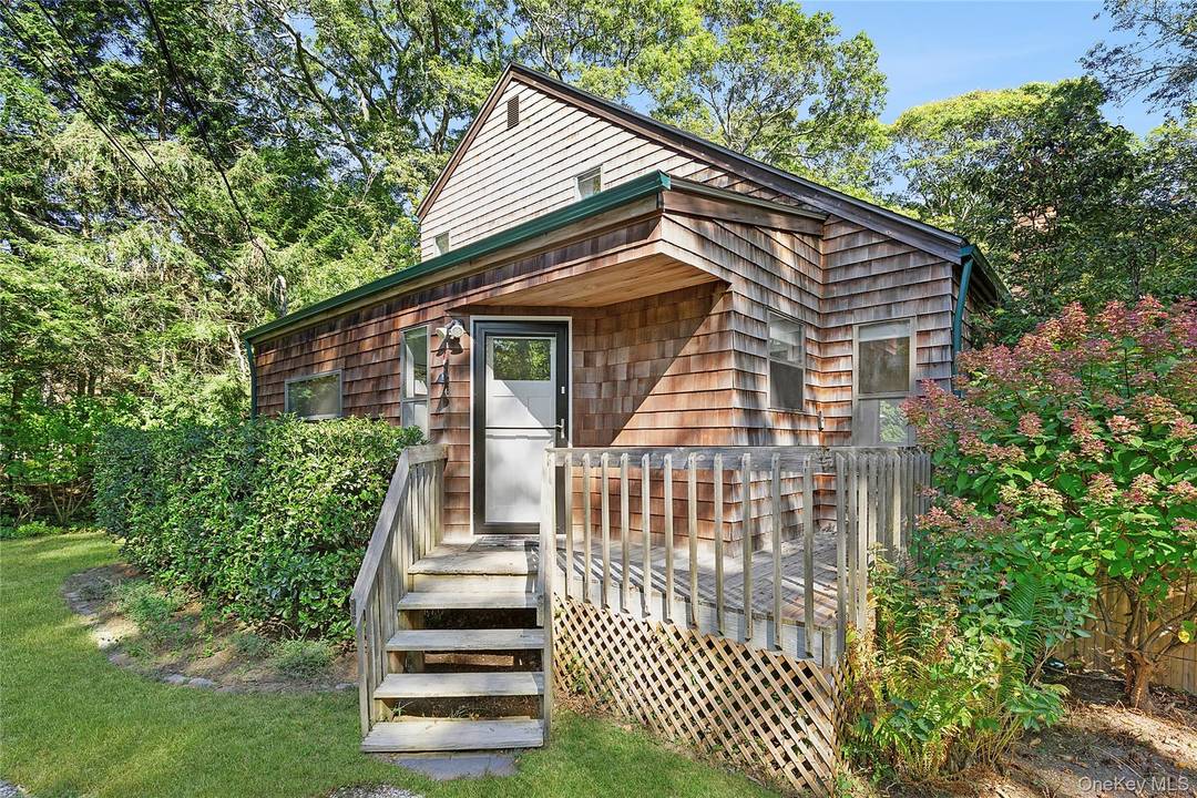Tucked away saltbox home with an inground pool and abundant decking to entertain upon in beautiful East Hampton.