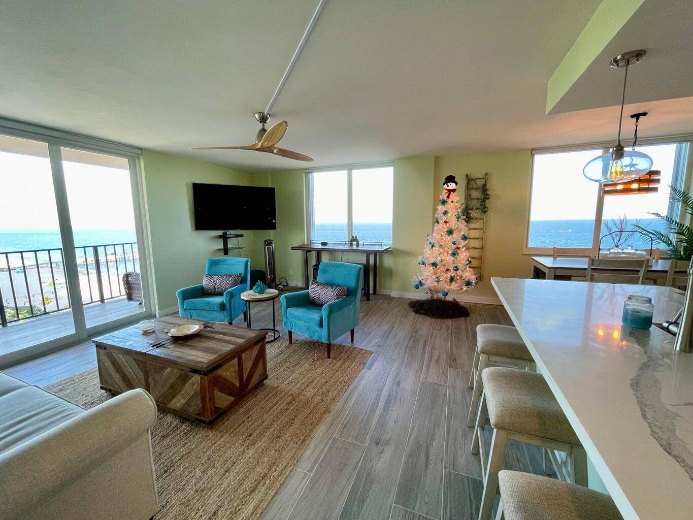 A stunning beachfront condominium boasting breathtaking views from every window.