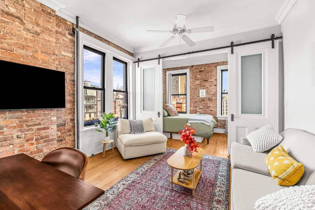 BACK ON THE MARKET ! On the top floor of this charming Soho building sits this lovely, bright, and perfectly appointed one bedroom gem.