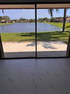 EXPERIENCE LAKEFRONT VIEWS AT THEIR BEST IN THIS impeccable 3 bedroom, 2 bath villa with a 1 car garage.