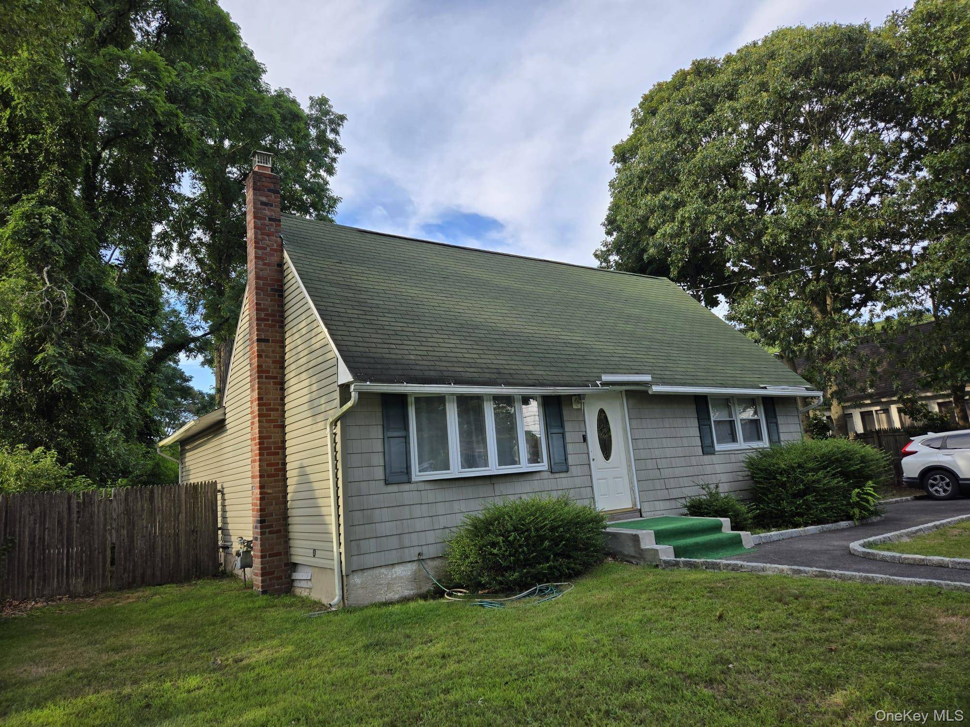 Fully Renovated Cape with CAC, Hi Hats, Open concept Living room, Dinning room, Eat in kitchen with stainless steel appliances, Large fenced yard, close to shopping and main roads.