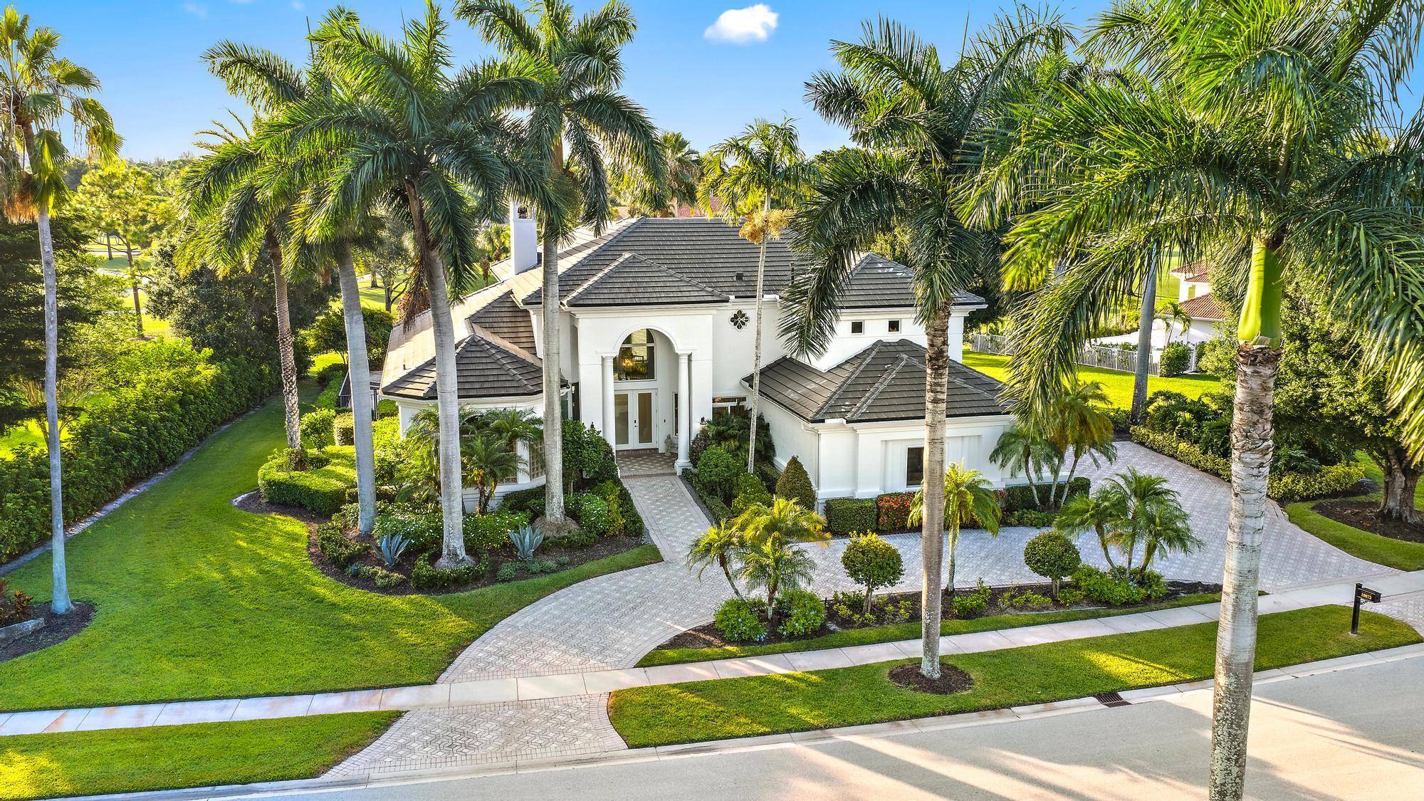 Expanded, customized, and RENOVATED 5, 000 sq ft Toll Brothers home situated on a premium, oversized half acre lot with stunning double fairway views.