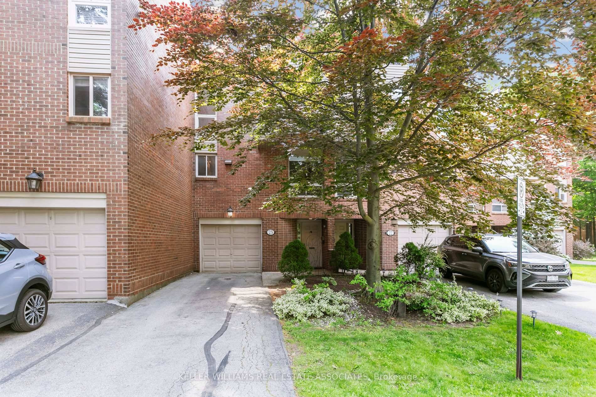 Tucked away in Oakville's hidden gem Treetop Estates this rare townhome is where modern living meets a forested escape.