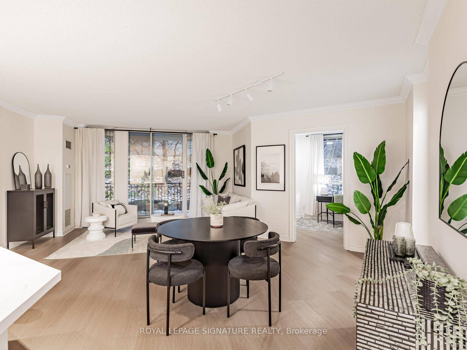 Welcome to 28 William Carson Crescent, Suite 219 a peaceful residence surrounded by mature trees and manicured grounds.