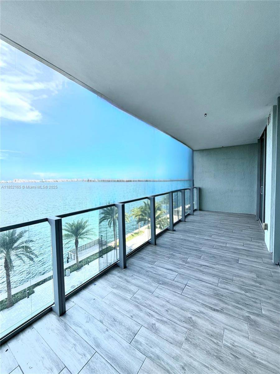 Experience breathtaking Biscayne Bay views from this 2 bed den, 3 bath residence at Biscayne Beach.