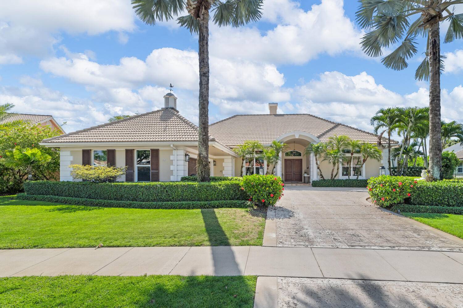 Beautiful estate located in Wellington's sought after neighborhood of Polo West.