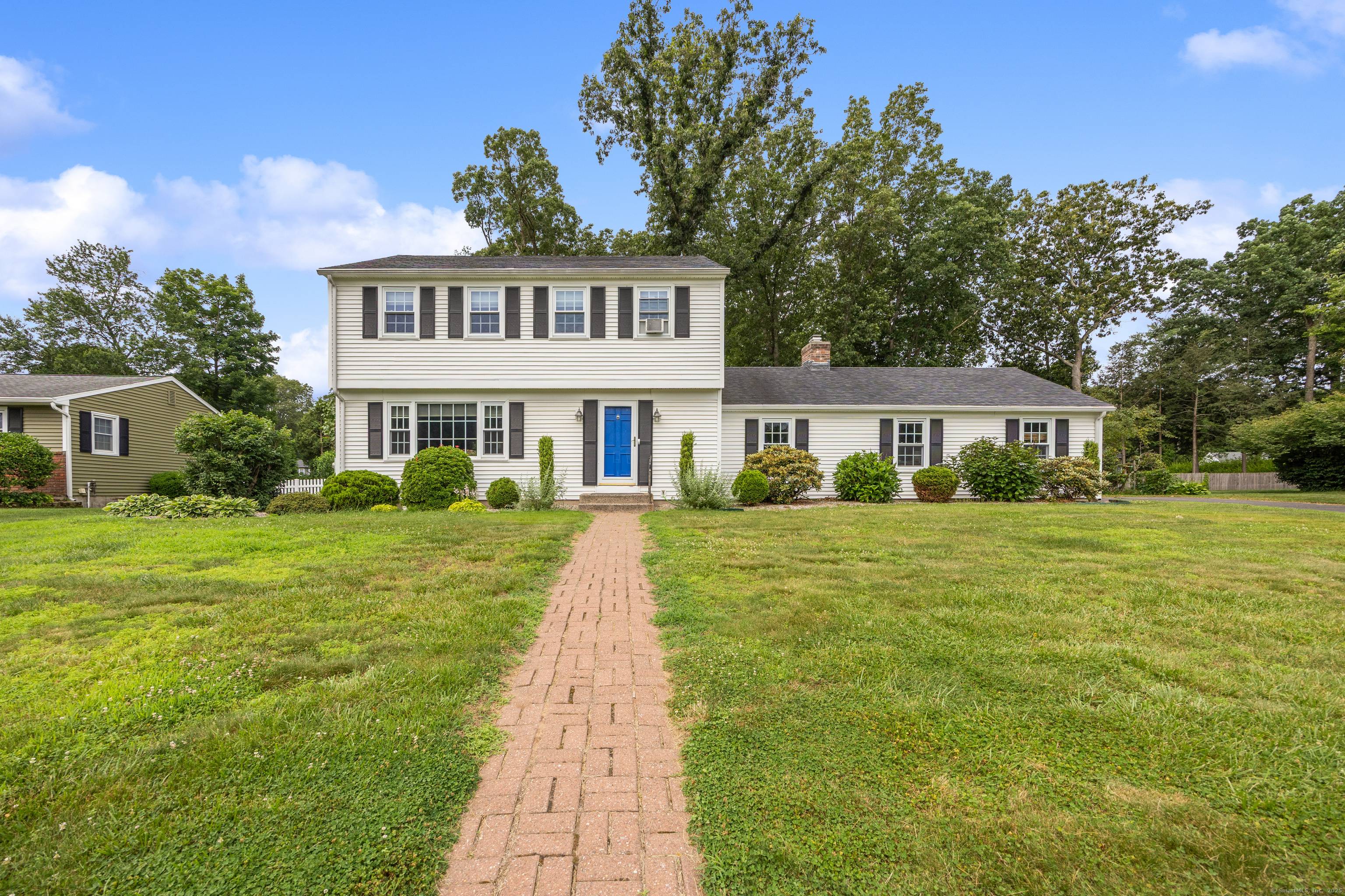 Impeccably maintained Colonial located in one of Cheshire's most desirable neighborhoods !