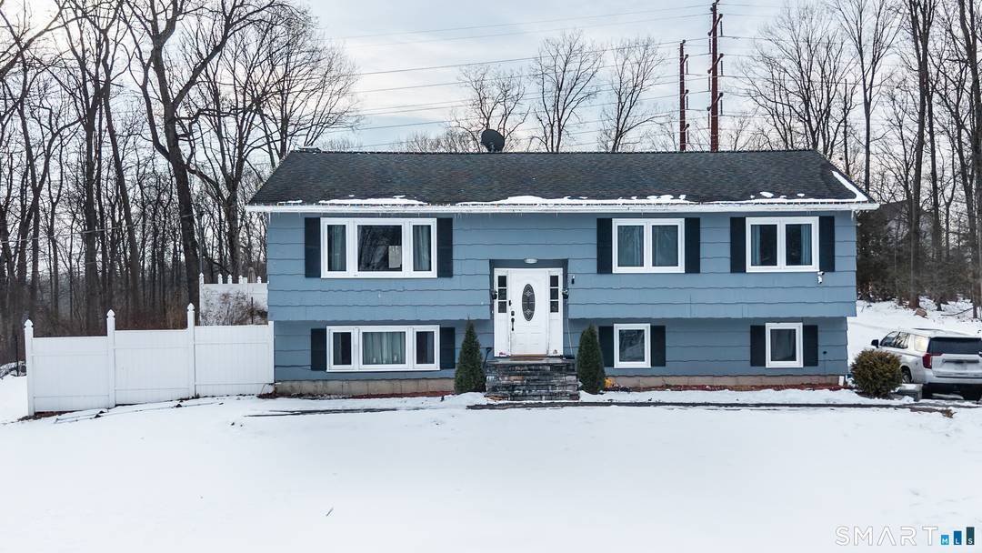 Bright and airy raised ranch located in the desirable White Hills section of Shelton, set on over one acre of land.