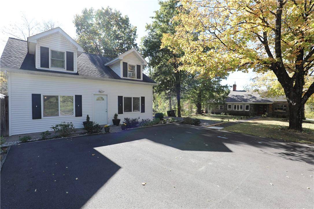 Rare opportunity to own two distinct homes on a single lot, both overlooking the Esopus Creek.