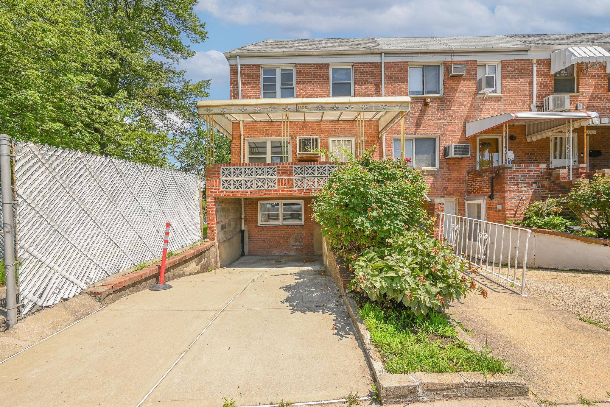 Welcome to 105 01 Horace Harding Expressway a Spacious and bright, charming brick semi attached one family home in the desirable neighborhood of Flushing.
