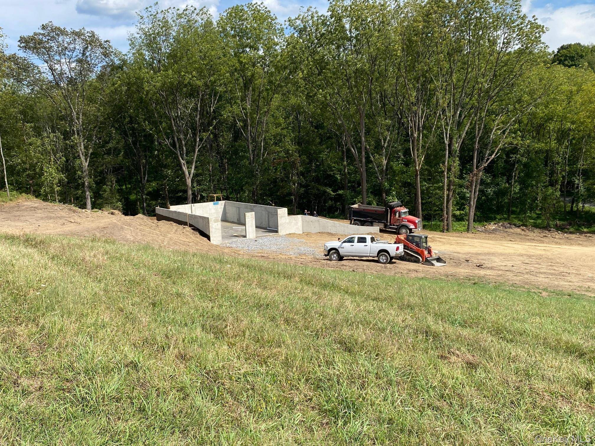 New construction colonial being built in Round Hill Estate, a picturesque 6 lot subdivision nestled in the charming town of Warwick.