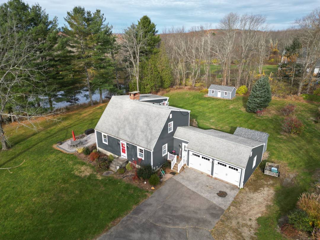 Rarely on the market, a 84 acre parcel with a 1615 sq ft updated home with a two car attached garage overlooking a pond with a Barn and an additional ...