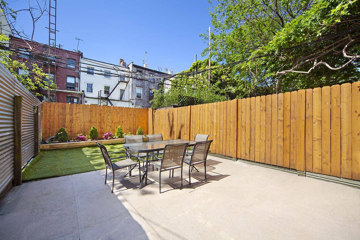 Duplex with Outdoor Space This newly renovated home is on the 1st floor and enjoys a private outdoor space facing south with great sunlight.
