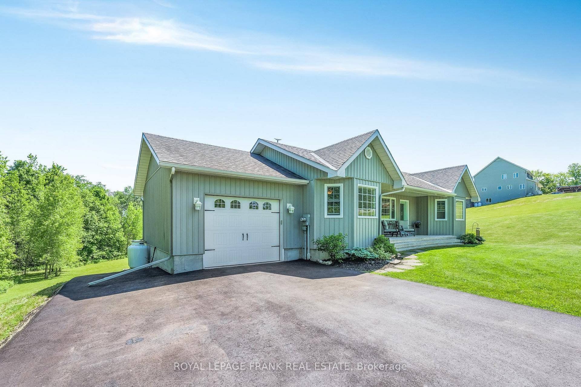 Welcome to this charming and spacious 3 1 bedroom, 2 bathroom bungalow nestled on a stunning 2.