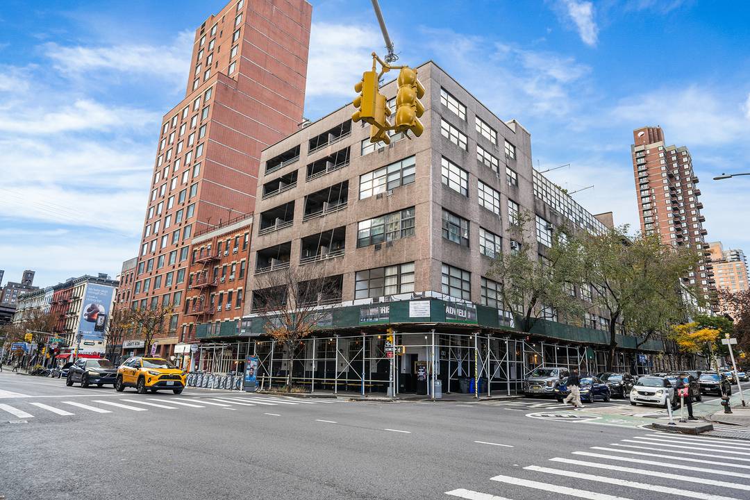 Enter inside The Beekman, an iconic 1918 prewar loft condominium known for its dramatic iron framed windows and classic architectural character.