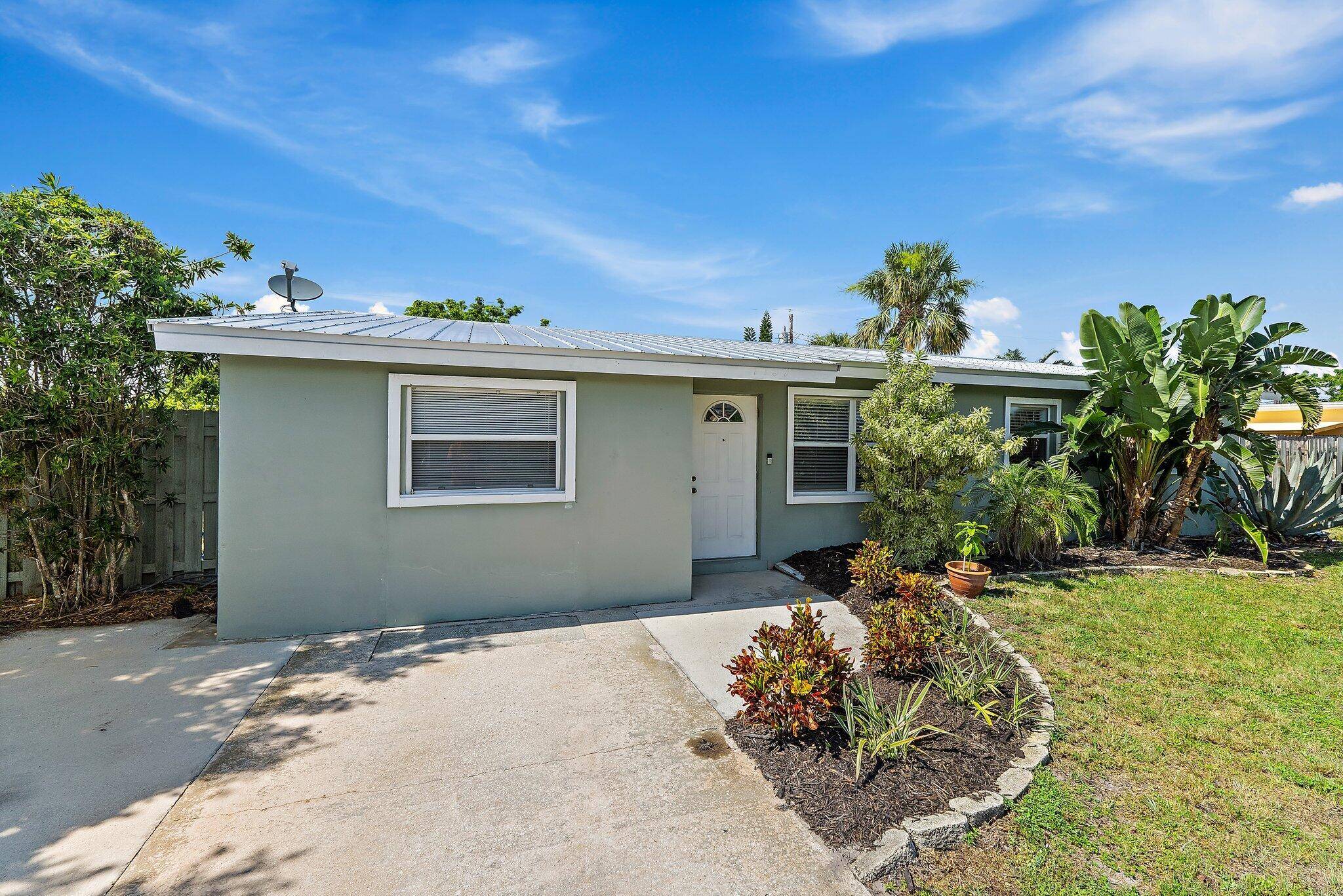 Welcome to this beautifully updated 4 bed, 2 bath home in the heart of Stuart !