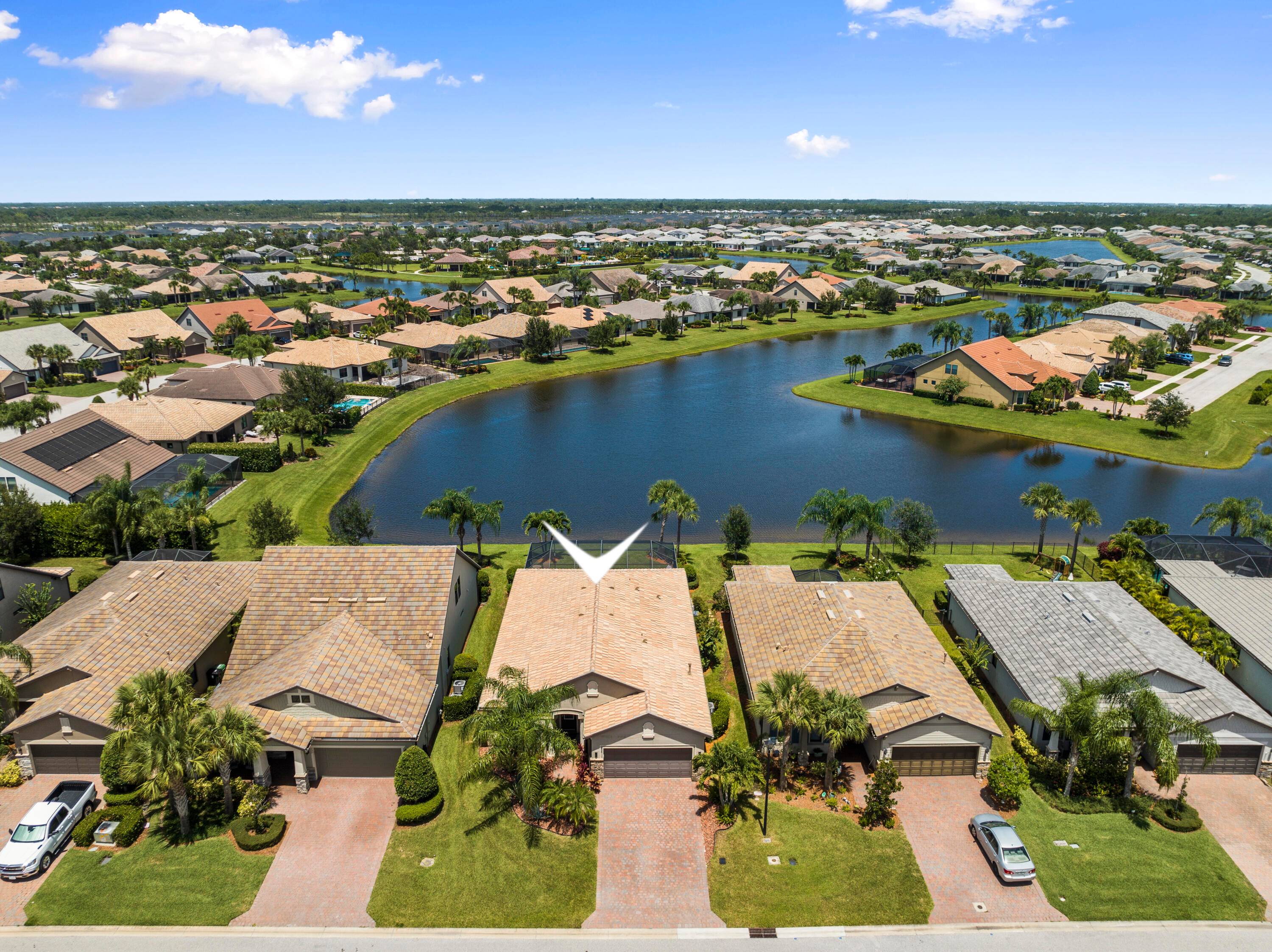 CBS 3Bed Office 2Bath 2 Car Gar with long lake views.