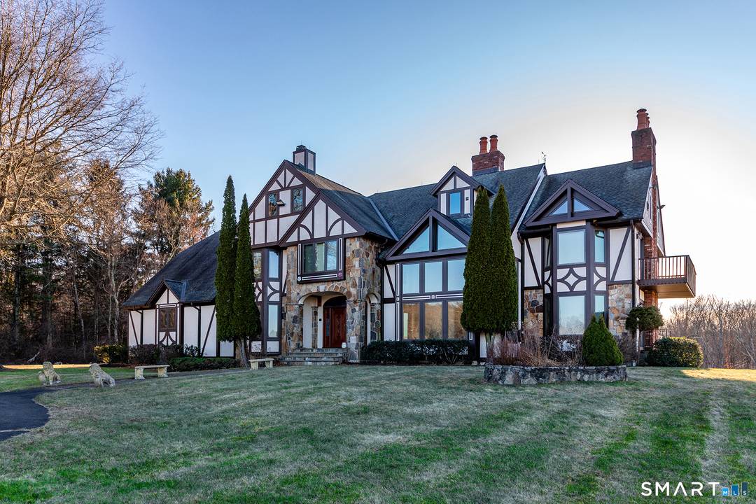 Perched above the tranquil waters of Jacks Brook in southern Roxbury, this Modern Mountain Tudor offers refined open concept living with exceptional accessibility to New York City, just five minutes ...