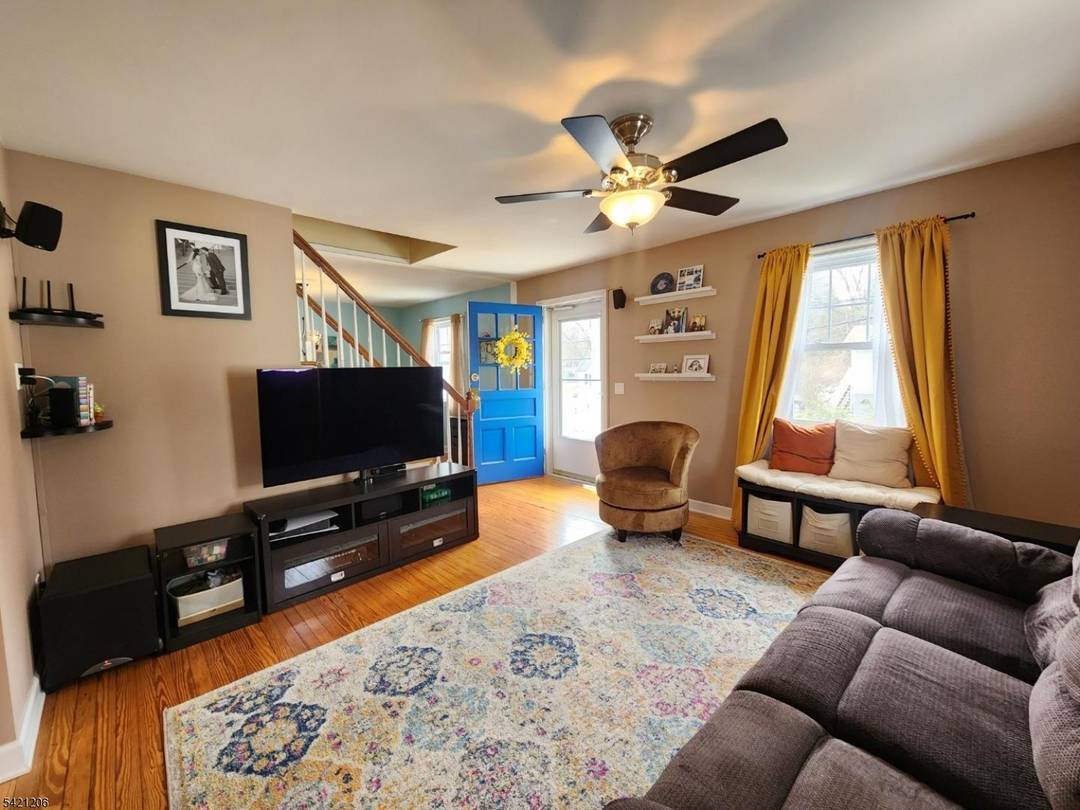 Welcome to this charming, lovingly maintained expanded Cape Cod home !