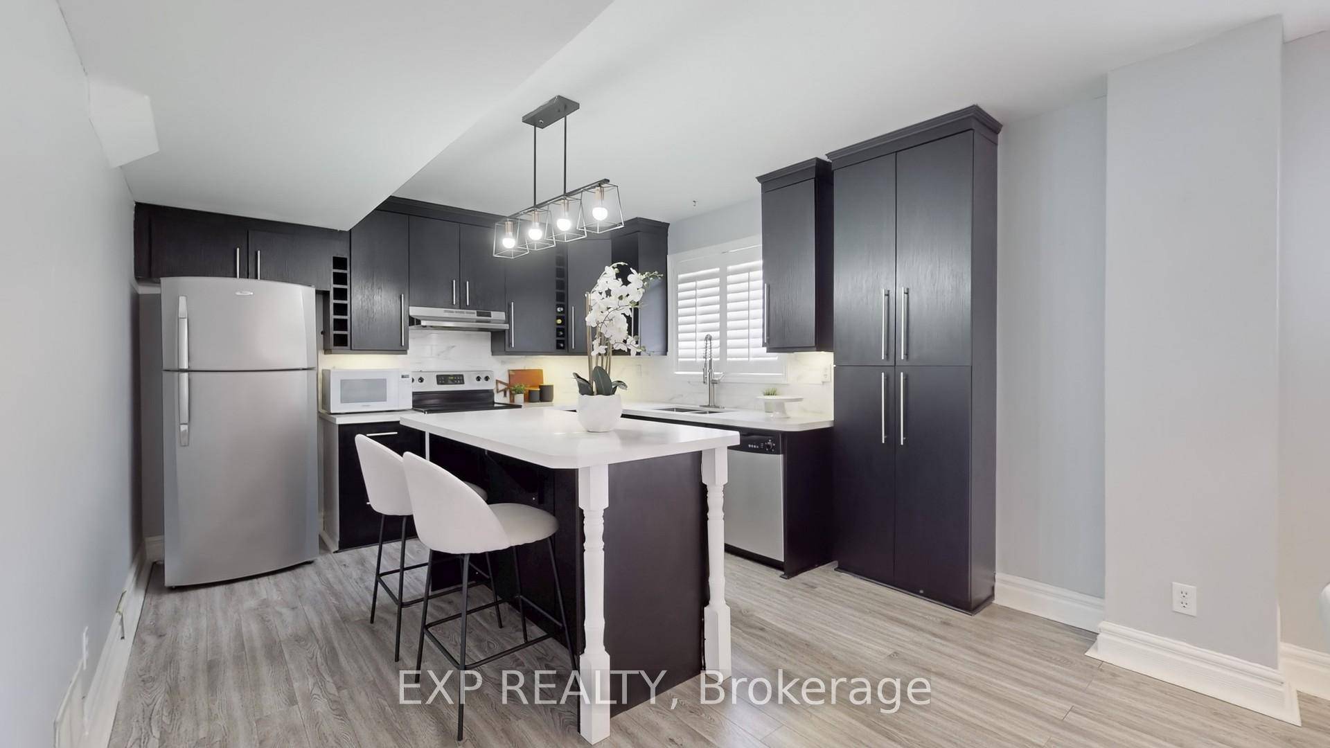 Stunning All Brick Raised Bungalow in Prime Alcona This beautiful 4 bedroom raised bungalow offers 2, 104 sq.