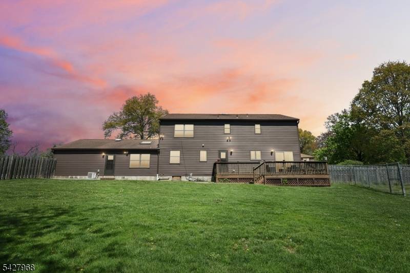 Set on a gorgeous corner lot in a serene and desirable cul de sac, this stately Colonial offers space, location, and incredible potential.