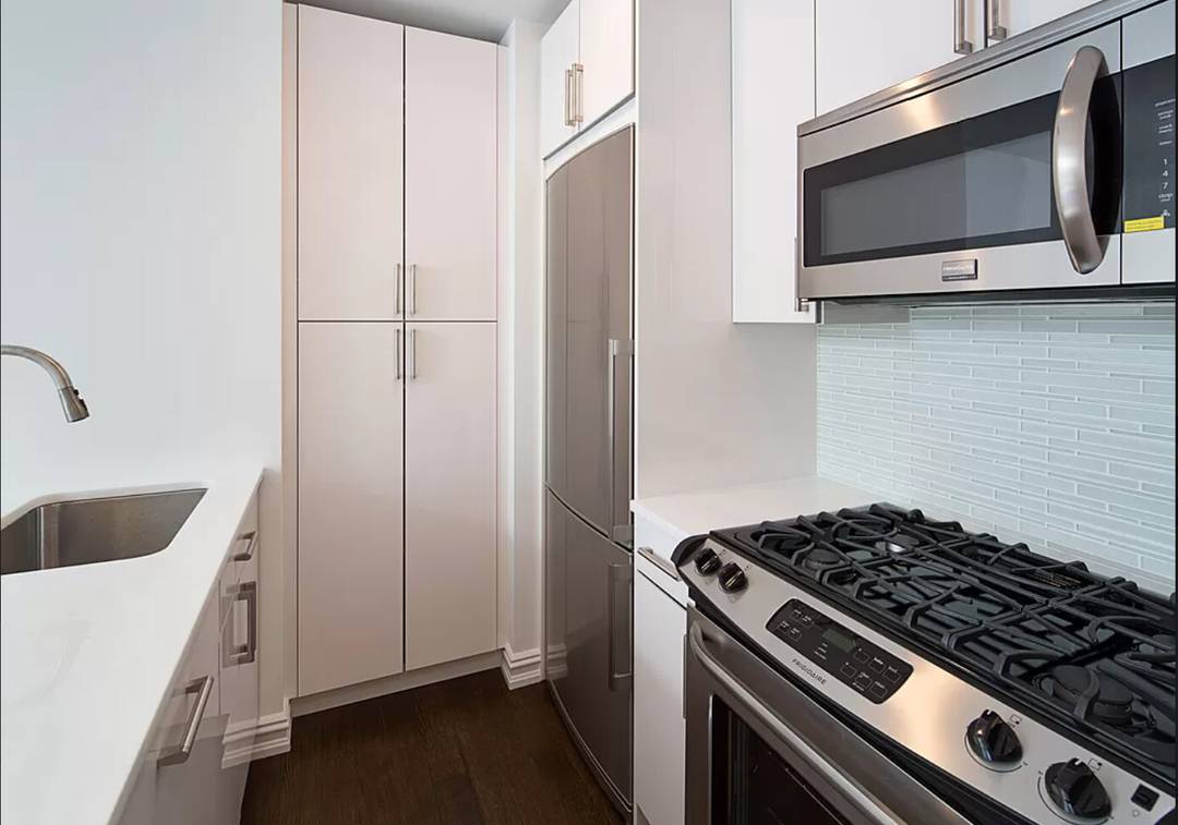 High floor 1 bedroom, 1 bath residence at 212 East 47th Street, Unit 31H.