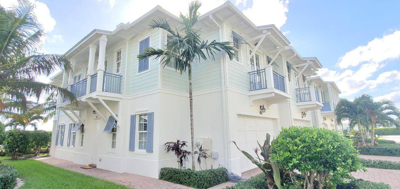 Just steps from the ocean and Juno Beach Pier, this modern Key West style townhome built in 2017 boasts high ceilings, 3 bedrooms, 2.