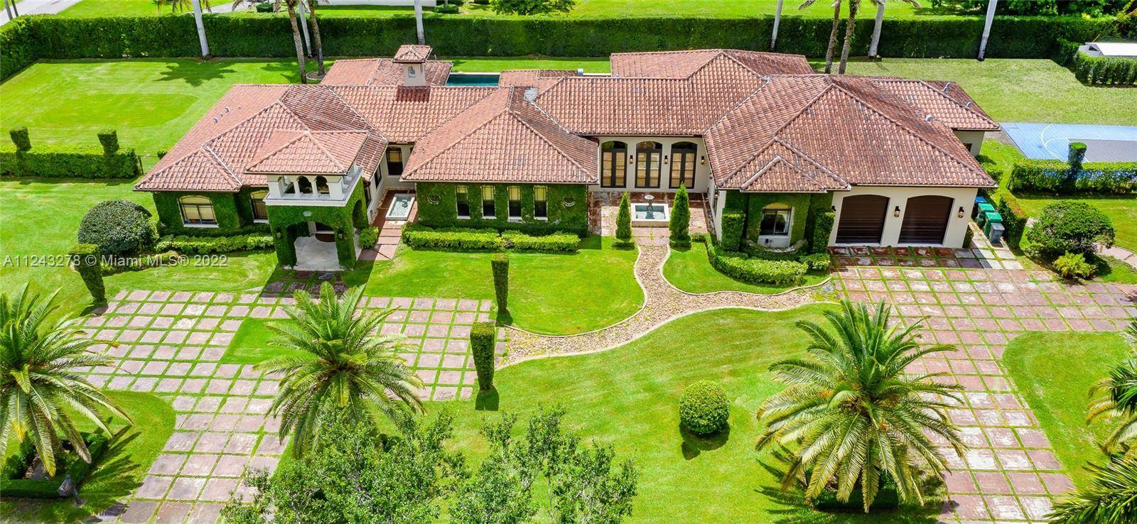 Beautiful Tuscan inspired home nestled in Sunset on 1 acre corner lot.