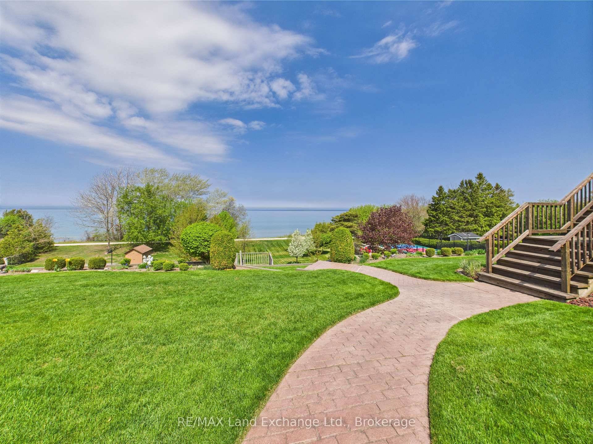 Experience the ultimate in lakeside living with this beautifully maintained lakefront bungalow, perfectly positioned to capture breathtaking sunsets over Lake Huron.