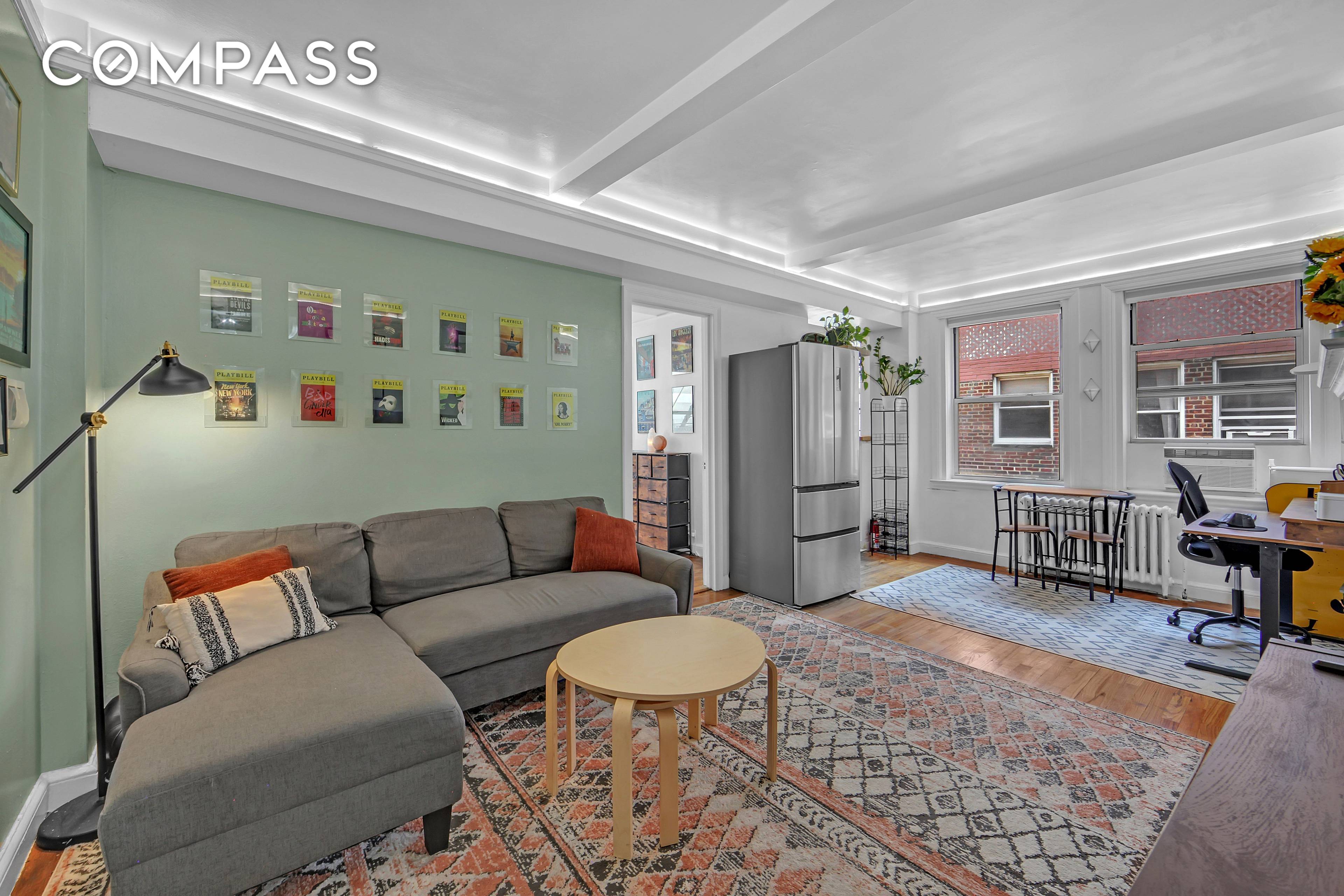 This one bedroom, one bathroom co op unit at The Manor boasts timeless elegance and modern functionality.