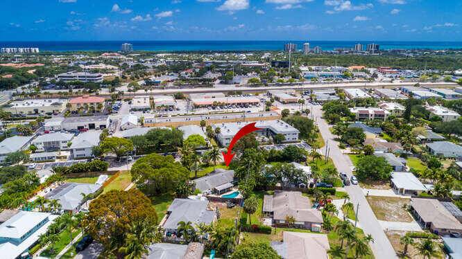 Sunny corner lot featuring 2Br 2Ba bonus room, currently office.