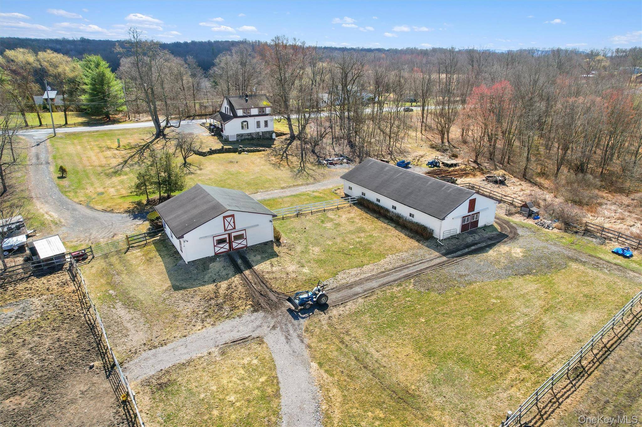 Presenting T. L. C. Farm 21 pastoral acres featuring 2 center aisleway barns, an indoor arena, a 2 stall run in shed, 5 fields paddocks, and a charming 1870 home ...