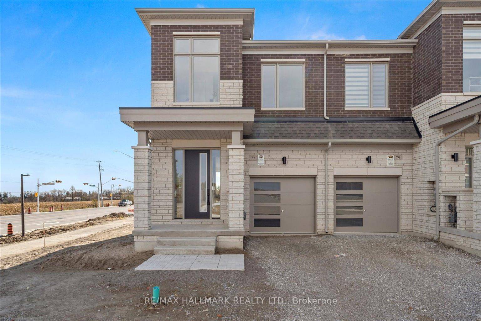 Welcome to this stunning end unit townhouse located in the desirable Oakridge Meadows community, built by Royal Pine Homes.