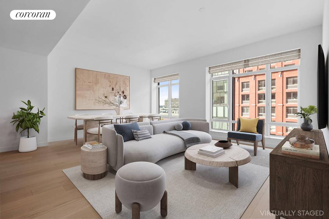 This expansive 2 bed 2. 5 bath condo has open plan living and dining areas featuring a kitchen with a custom Olson Kundig designed Jack box, warm wood flooring, and ...