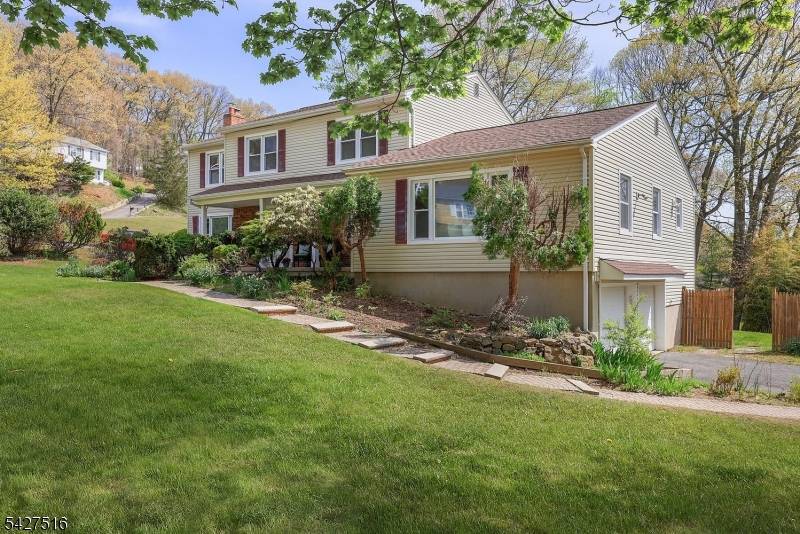 A beautiful home in the highly sought after Woodland Ridge Shongum section of Randolph.
