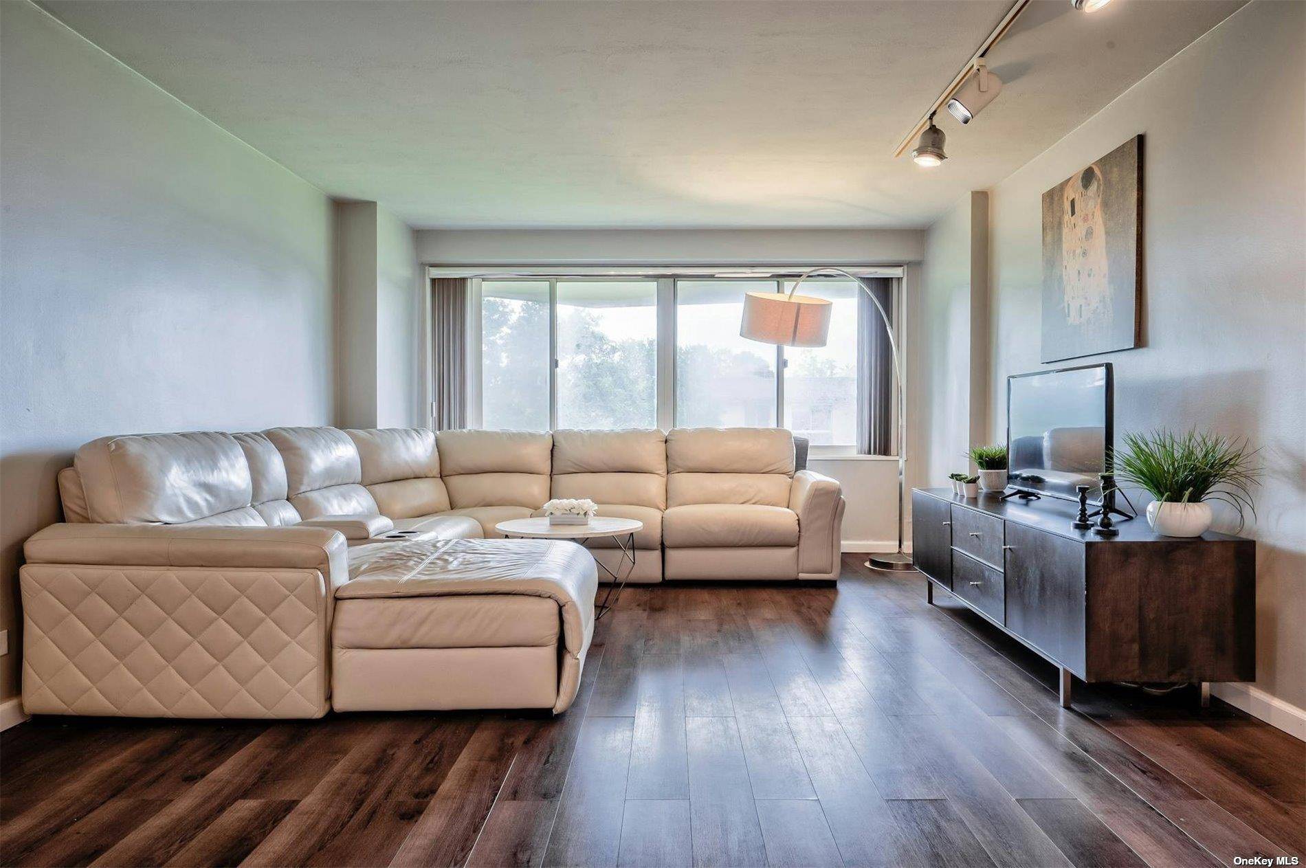 Presenting an exquisite, renovated two bedroom, two bath residence on the first floor of the prestigious Towers at Water's Edge.
