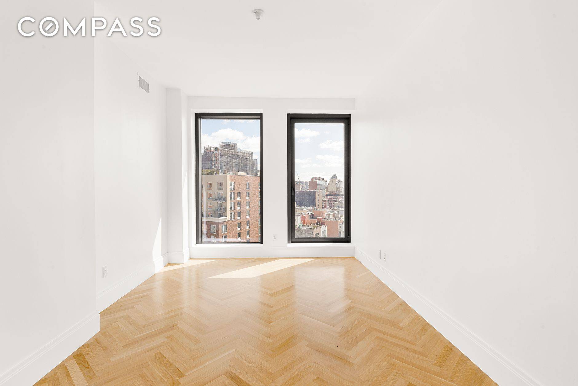Fall in love with pristine designer interiors and wide open views in this brand new two bedroom, two bathroom residence in a stunning full service condominium debuting in South Harlem.